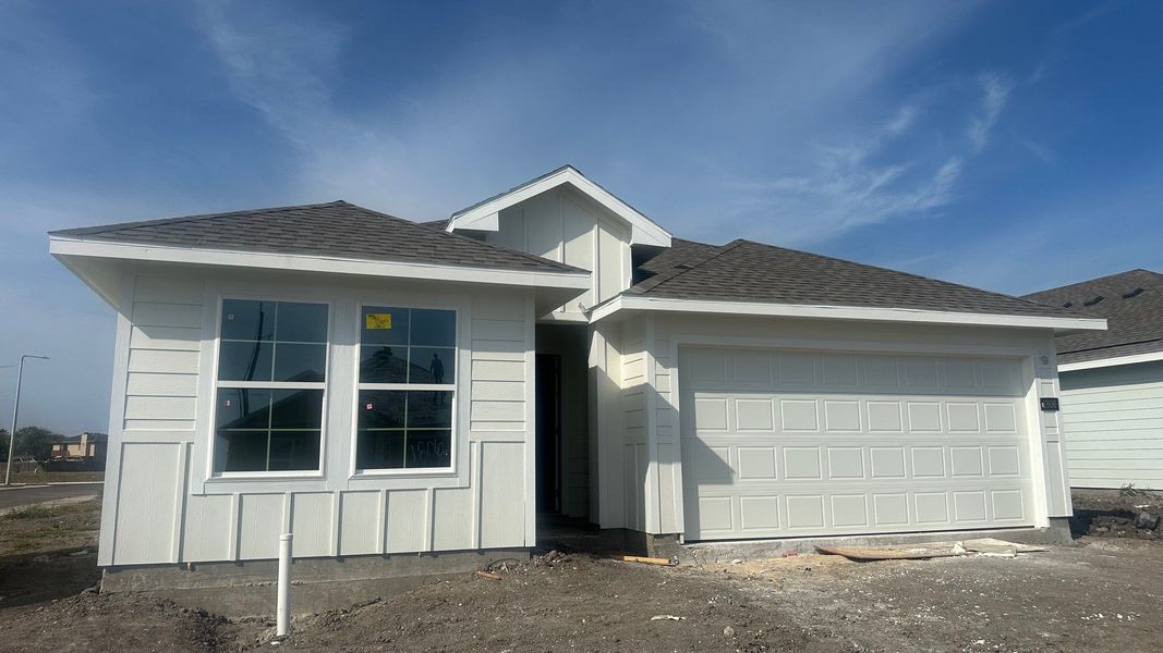 Front exterior of a new home in Saratoga Crossing, Corpus Christi, TX, highlighting curb appeal (Image 2).