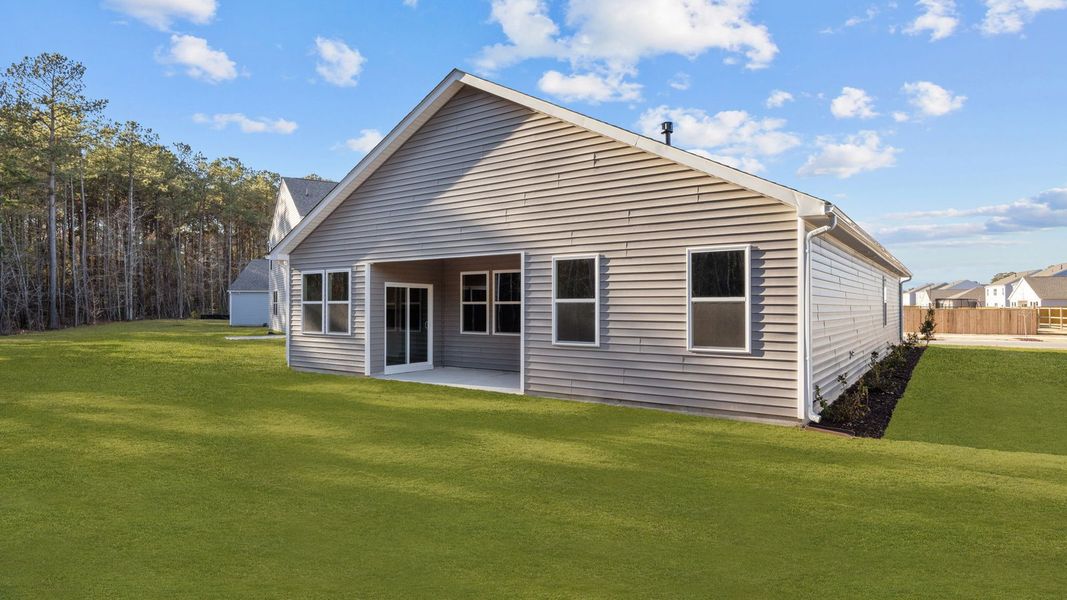 Exterior details and patio area of a home in West New Bern, New Bern (Image 20).