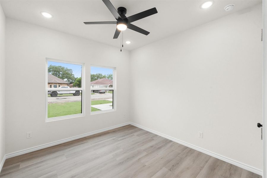 Recessed lighting illuminates this room, offering both comfort and modern convenience. Recessed lighting illuminates this room, offering both comfort and modern convenience.