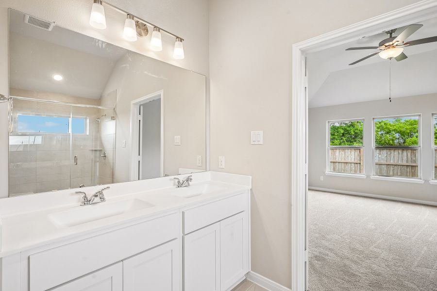 Furnished interior view inside a new home in Aldeana, Bonney (Image 11).
