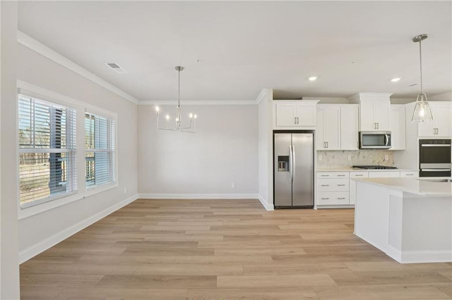 Spacious, unfurnished interior of a new home in Hemingway - Highland Series, Cumming (Image 42).