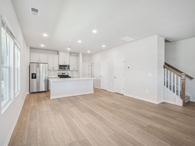 Spacious, unfurnished interior of a new home in The Rows at Buffaloe Reserve, Raleigh (Image 10). Spacious, unfurnished interior of a new home in The Rows at Buffaloe Reserve, Raleigh (Image 10).