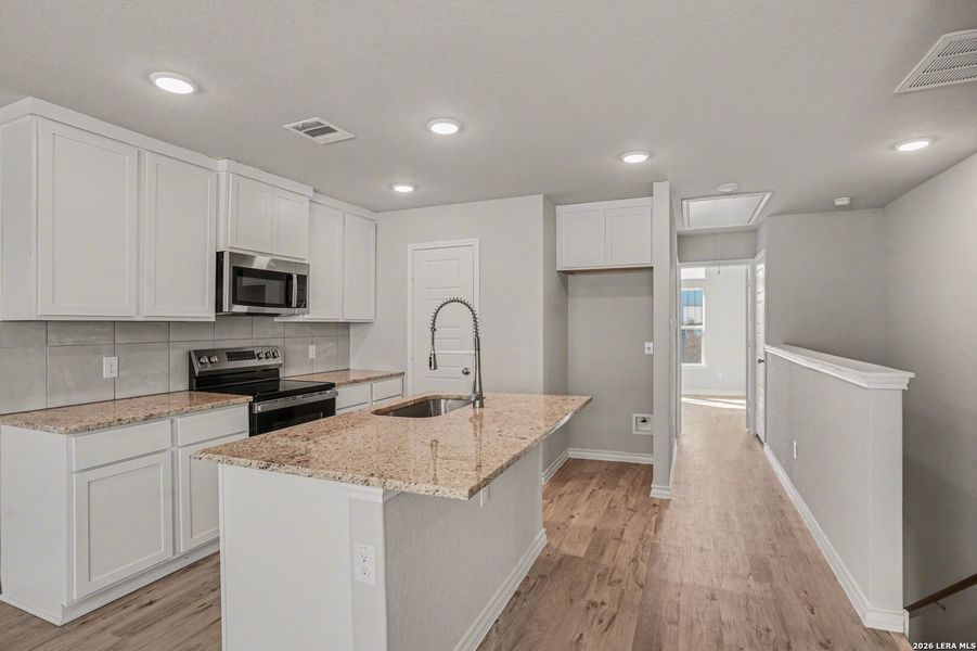 Furnished interior view inside a new home in , San Antonio (Image 3).