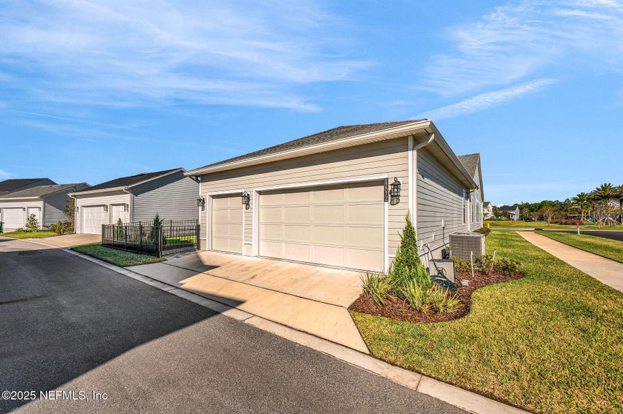 Front exterior of a new home in Seven Pines, Jacksonville, FL, highlighting curb appeal (Image 2). Front exterior of a new home in Seven Pines, Jacksonville, FL, highlighting curb appeal (Image 2).