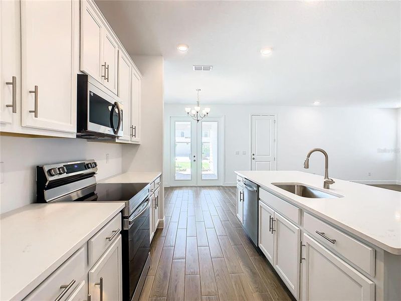 Furnished interior view inside a new home in , Winter Garden (Image 11).