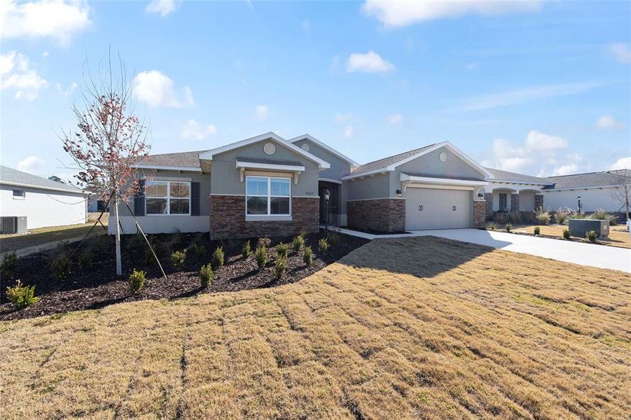 Front exterior of a new home in , Ocala, FL, highlighting curb appeal (Image 22).