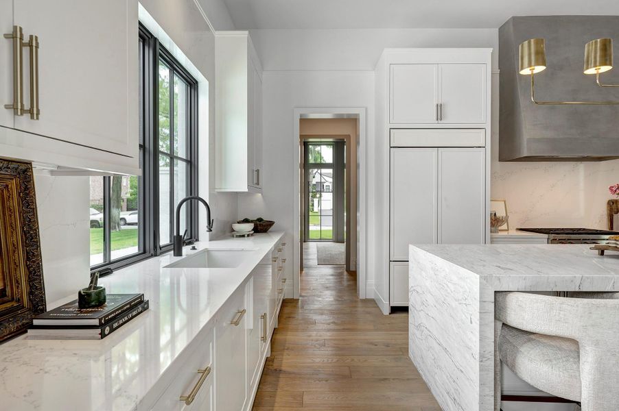 Lovely window over the sink.  The windows and flow of light in this home is amazing!