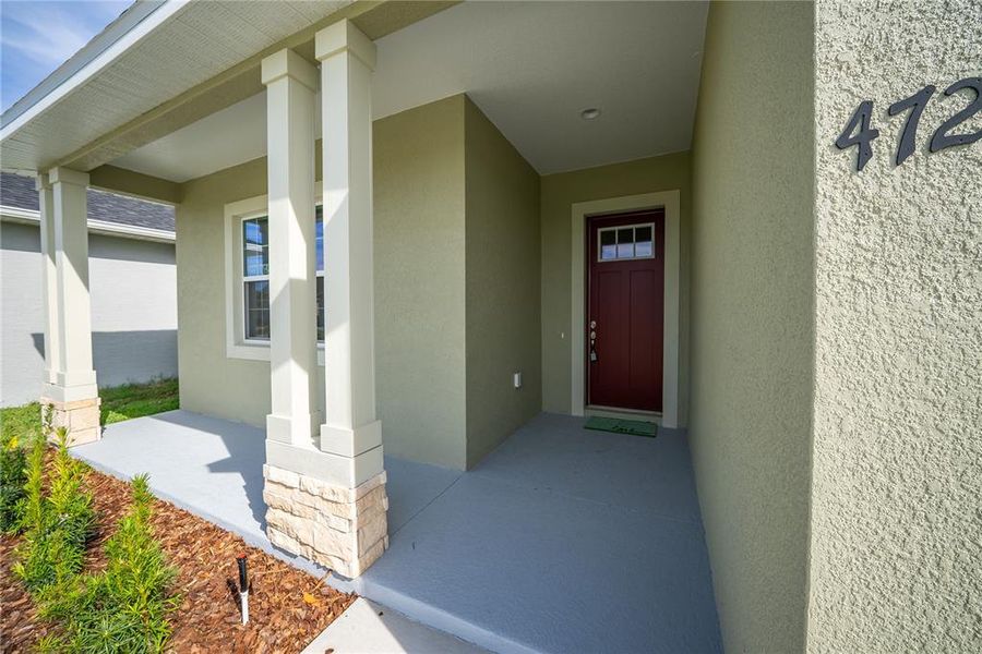 Exterior details and patio area of a home in , Ocala (Image 3).