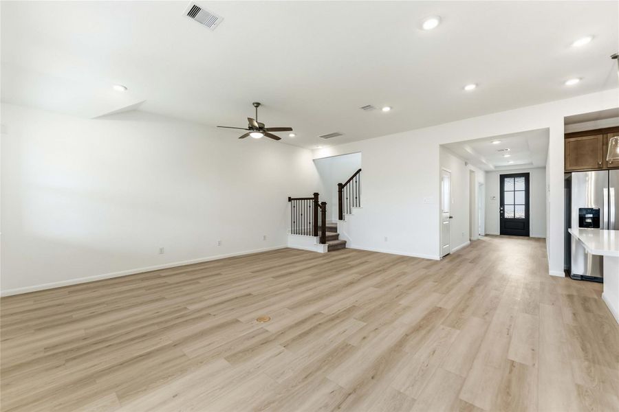 Spacious, unfurnished interior of a new home in Sunterra, Katy (Image 19).