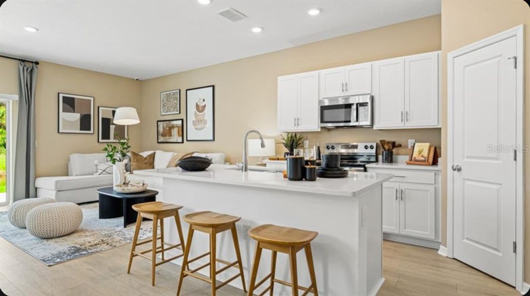 Furnished interior view inside a new home in The Towns at Tiburon, Nokomis (Image 11).