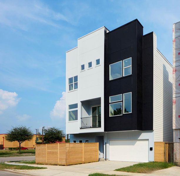 Stunning modern architecture at its finest! This sleek, contemporary three-story home offers a bold exterior with clean lines, large windows, and an inviting front entry. Located across from the University of Houston, it’s the perfect combination of luxury and convenience. Stunning modern architecture at its finest! This sleek, contemporary three-story home offers a bold exterior with clean lines, large windows, and an inviting front entry. Located across from the University of Houston, it’s the perfect combination of luxury and convenience.