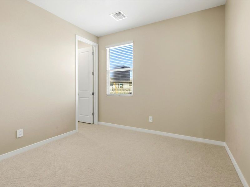 Spacious, unfurnished interior of a new home in White Tank Foothills Signature Series, Waddell (Image 19).