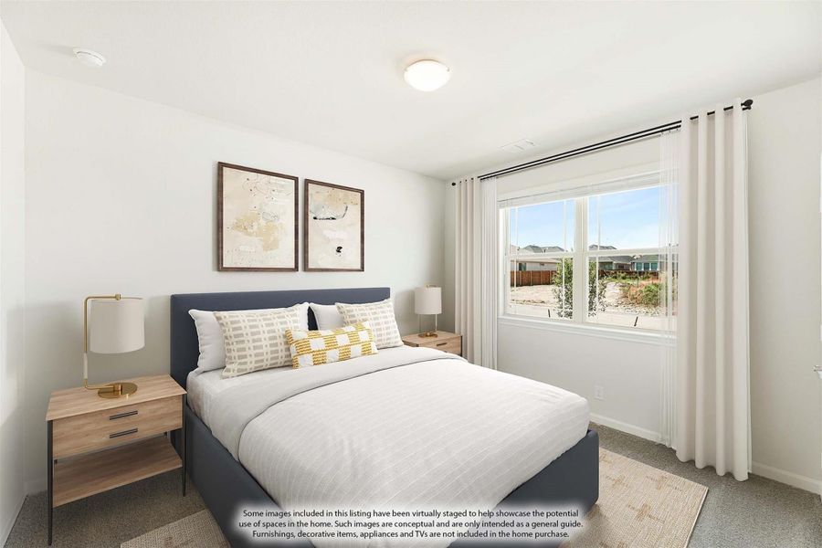 Bedroom with navy upholstered bed, white walls, carpet flooring, and a large window with white curtains