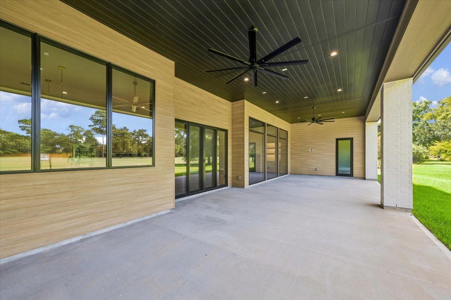 Exterior details and patio area of a home in , Houston (Image 27).