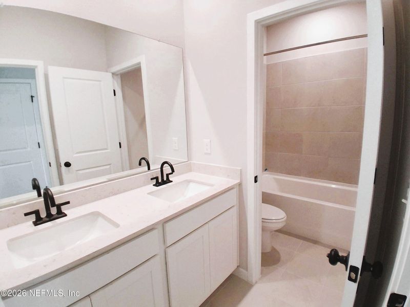 Furnished interior view inside a new home in Seminole Palms, Palm Coast (Image 10).