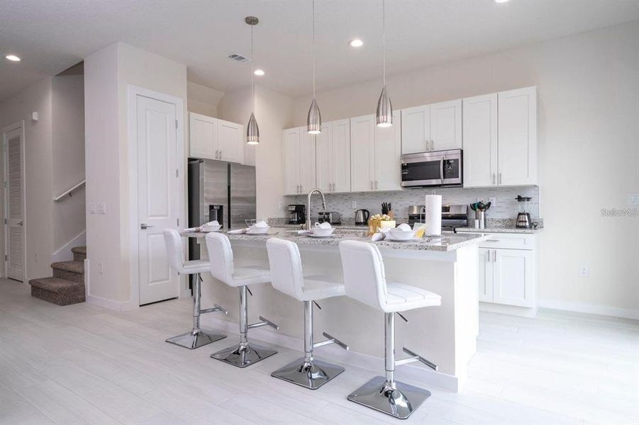 Furnished interior view inside a new home in , Kissimmee (Image 34). Furnished interior view inside a new home in , Kissimmee (Image 34).