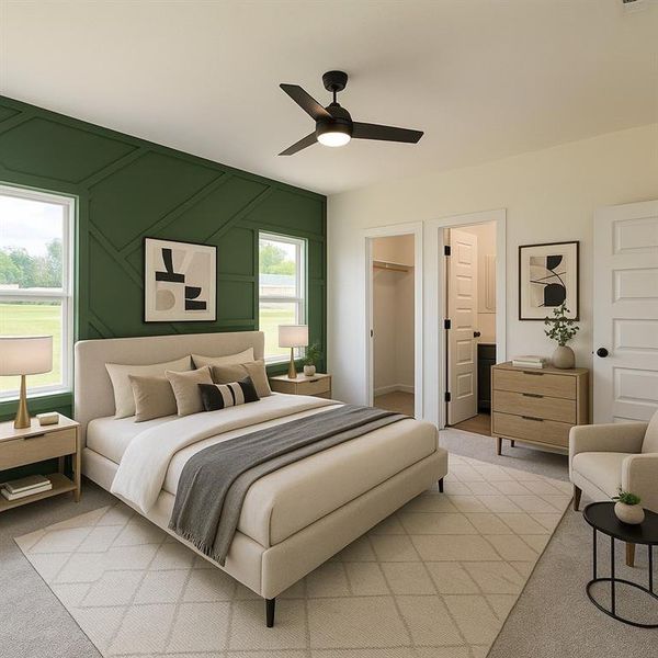 Bedroom with carpet floors, ceiling fan, a walk in closet, and a decorative wall Bedroom with carpet floors, ceiling fan, a walk in closet, and a decorative wall