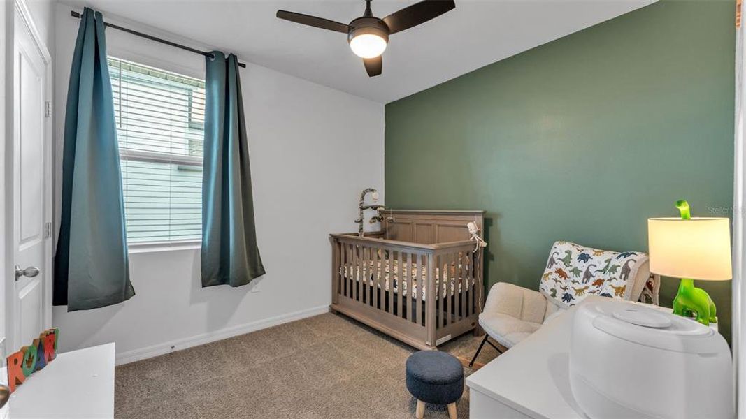 Furnished interior view inside a new home in The Grove at Stuart Crossing - Premier Series, Bartow (Image 15).