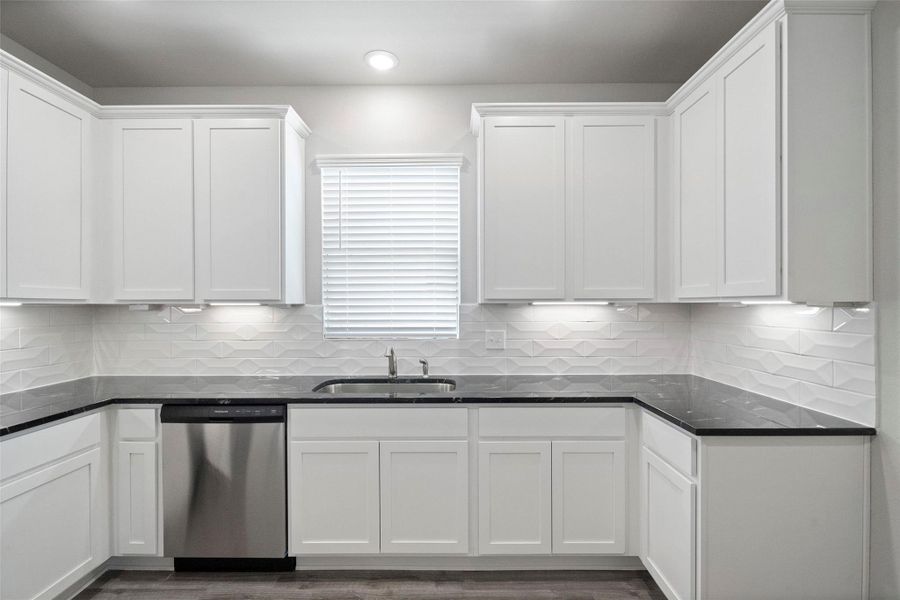 Furnished interior view inside a new home in Sunterra, Katy (Image 9).