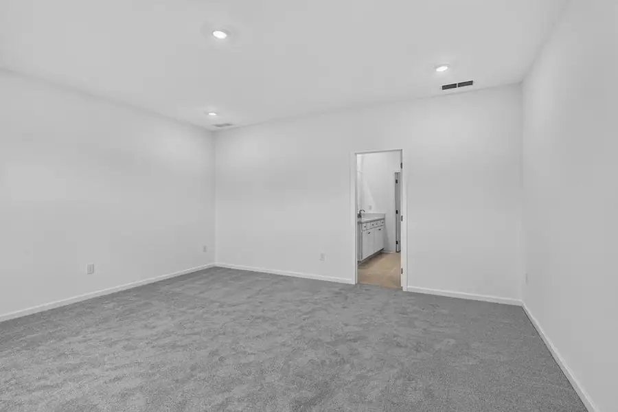 Spacious, unfurnished interior of a new home in Weatherfield, Buford (Image 23).