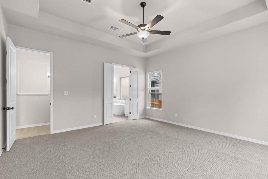 Primary Bedroom with tray ceiling