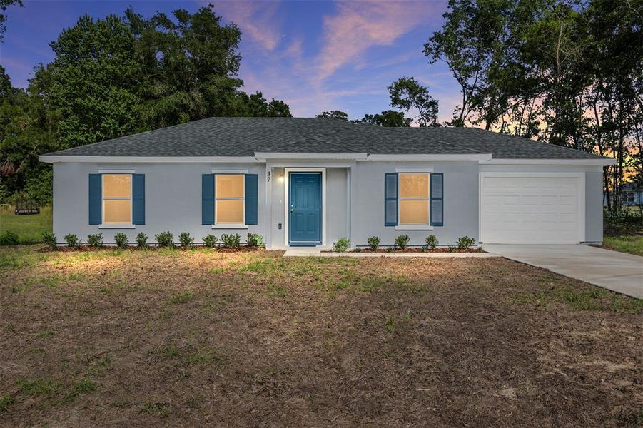 Front exterior of a new home in , Ocala, FL, highlighting curb appeal (Image 17).