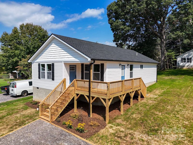 Front exterior of a new home in , Asheville, NC, highlighting curb appeal (Image 24).