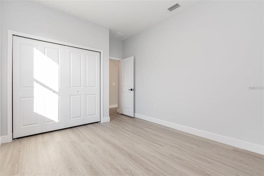 Spacious, unfurnished interior of a new home in , Port Charlotte (Image 20).