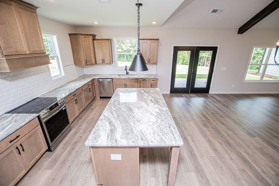 Furnished interior view inside a new home in WOODMONT RESERVE, Roopville (Image 10).