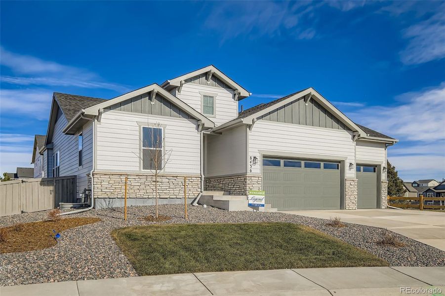 Front exterior of a new home in , Colorado Springs, CO, highlighting curb appeal (Image 2). Front exterior of a new home in , Colorado Springs, CO, highlighting curb appeal (Image 2).