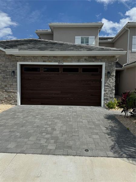Front exterior of a new home in , New Smyrna Beach, FL, highlighting curb appeal (Image 21).