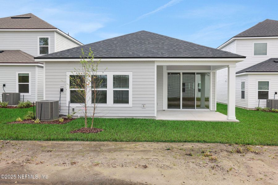 Exterior details and patio area of a home in Brook Forest, St. Augustine (Image 23).