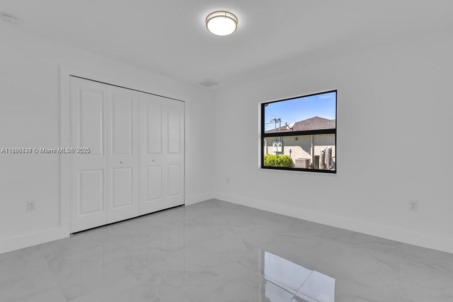 Spacious, unfurnished interior of a new home in , Lehigh Acres (Image 25).