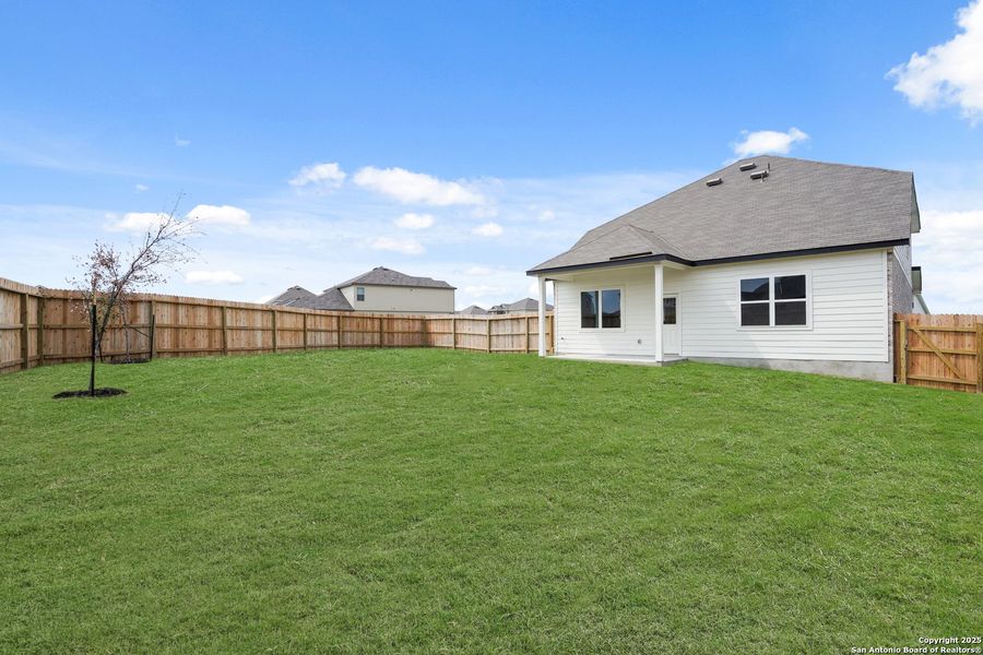 Front exterior of a new home in Cinco Lakes, San Antonio, TX, highlighting curb appeal (Image 19). Front exterior of a new home in Cinco Lakes, San Antonio, TX, highlighting curb appeal (Image 19).