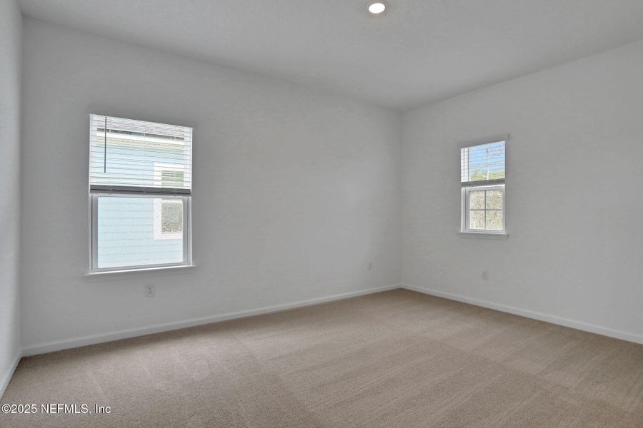 Spacious, unfurnished interior of a new home in TrailMark, St. Augustine (Image 40).