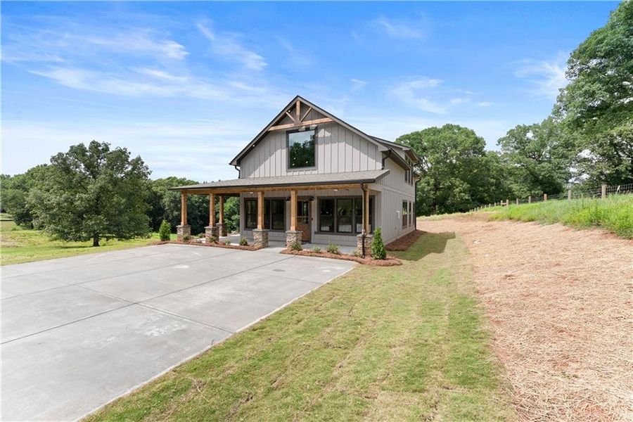 Front exterior of a new home in , Cleveland, GA, highlighting curb appeal (Image 24). Front exterior of a new home in , Cleveland, GA, highlighting curb appeal (Image 24).