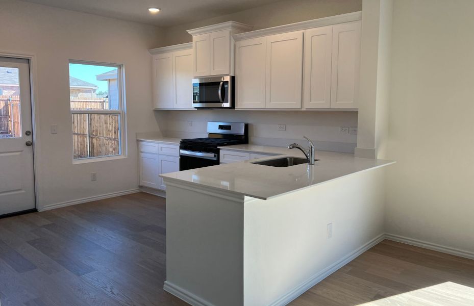 Representative furnished interior of a home built from the Paluxy by Centex in Cottonwood Creek, Howe (Image 5).