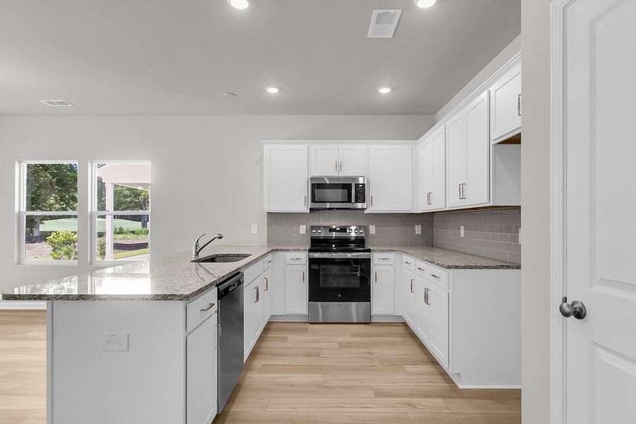 Furnished interior view inside a new home in Fairway Woods at Wyboo, Manning (Image 5). Furnished interior view inside a new home in Fairway Woods at Wyboo, Manning (Image 5).