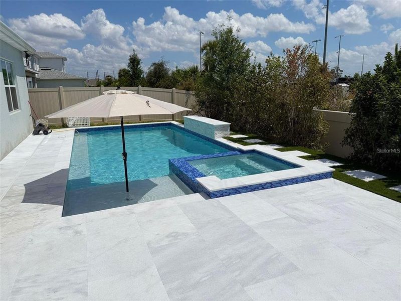 Exterior details and patio area of a home in Parkview Reserve, Orlando (Image 3).