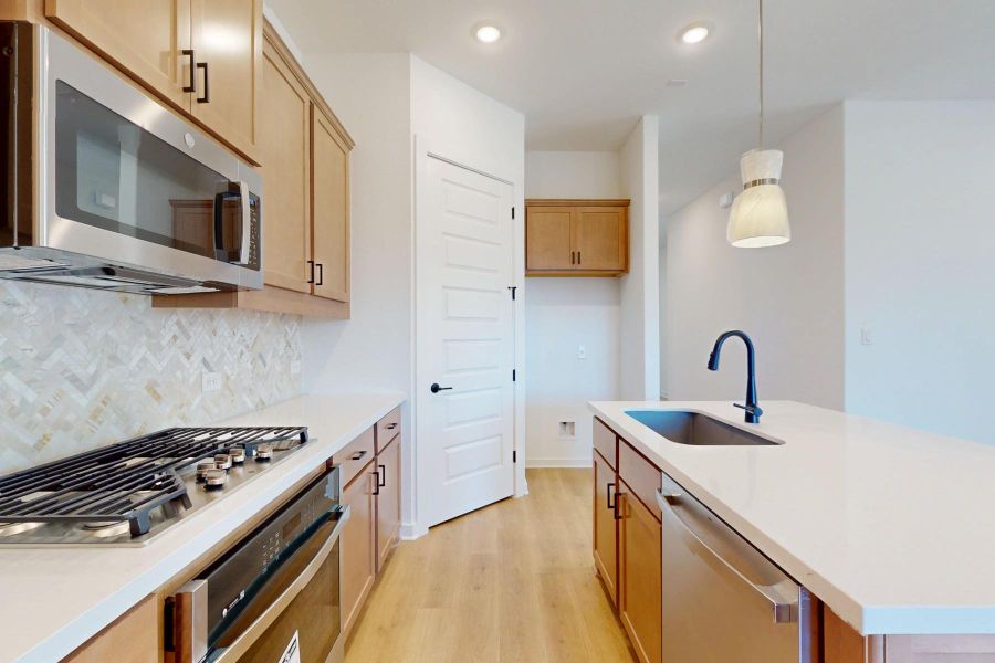 Furnished interior view inside a new home in Heritage, Dripping Springs (Image 6).