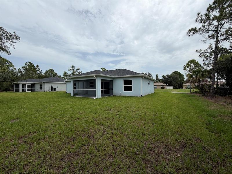 Exterior details and patio area of a home in , North Port (Image 24).