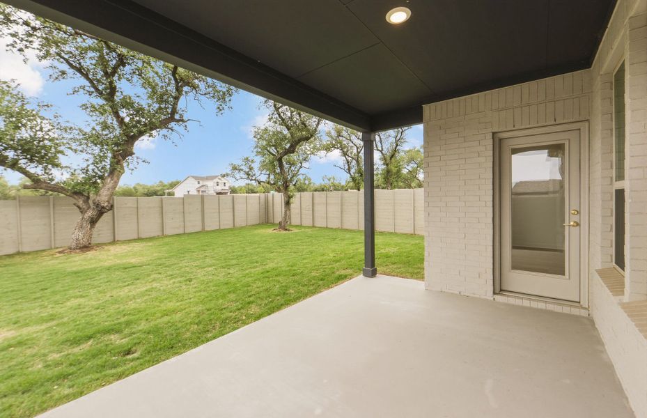 Exterior details and patio area of a home in Wolf Ranch, Georgetown (Image 29). Exterior details and patio area of a home in Wolf Ranch, Georgetown (Image 29).