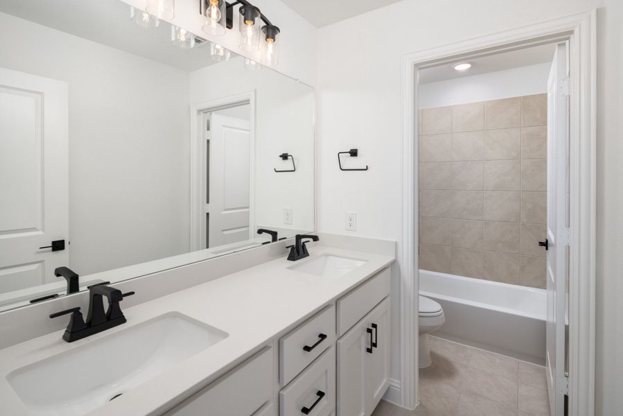 Furnished interior view inside a new home in Legacy Hills, Celina (Image 16).