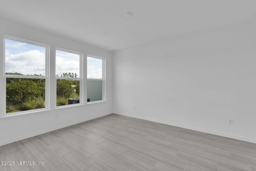 Spacious, unfurnished interior of a new home in Del Webb Wildlight, Yulee (Image 19).