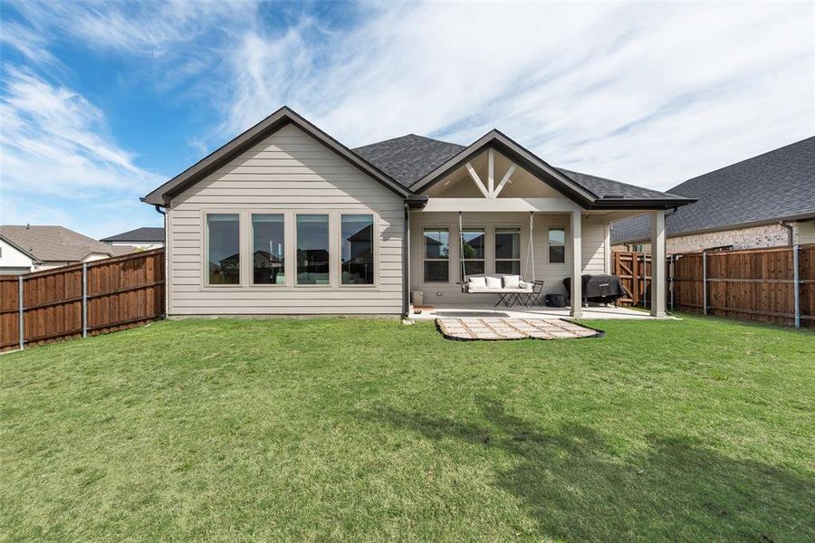 Exterior details and patio area of a home in Devonshire, Forney (Image 3).