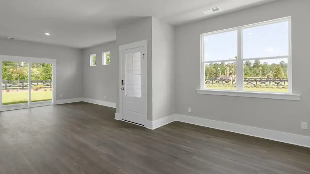 Spacious, unfurnished interior of a new home in The Retreat at Indigo Preserve Townhomes, Leland (Image 13).