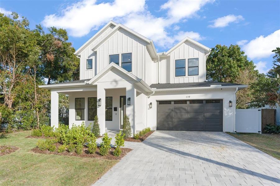 Front exterior of a new home in , Orlando, FL, highlighting curb appeal (Image 2). Front exterior of a new home in , Orlando, FL, highlighting curb appeal (Image 2).