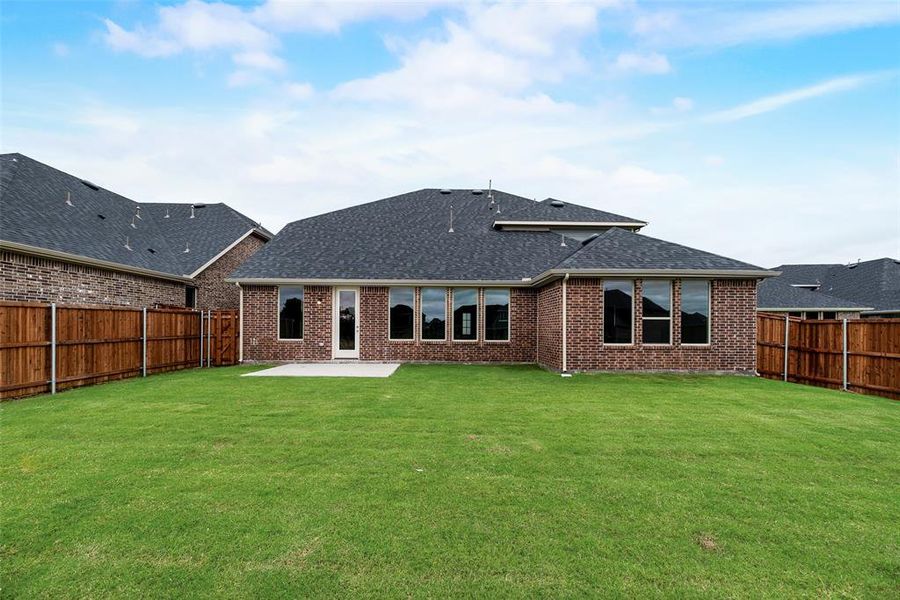 Front exterior of a new home in Valencia On The Lake, Little Elm, TX, highlighting curb appeal (Image 19).