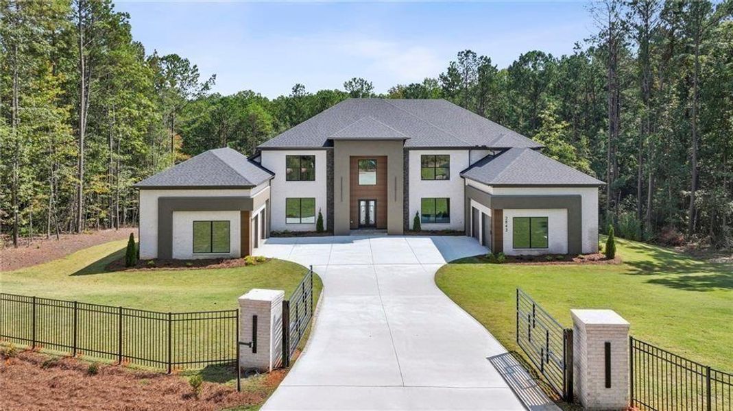 Front exterior of a new home in , Buford, GA, highlighting curb appeal (Image 26).