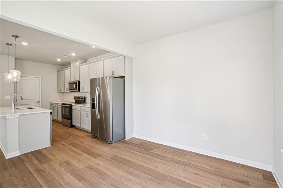 Furnished interior view inside a new home in Hawthorne Station, College Park (Image 14).